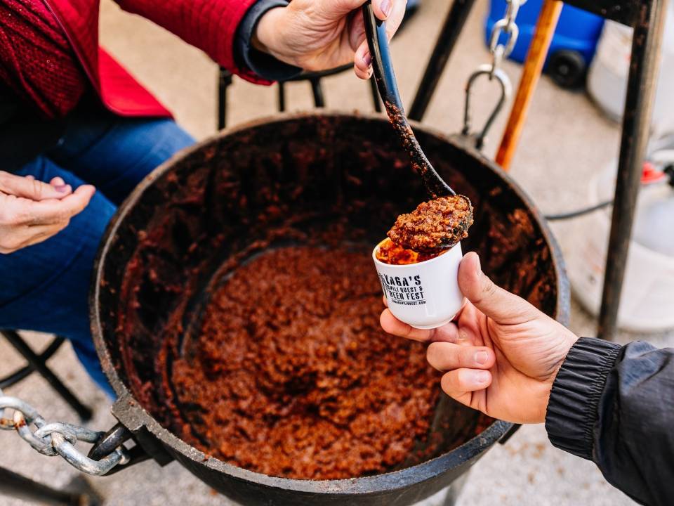 chili samples being served at yaga's chili quest & beer fest in Galveston