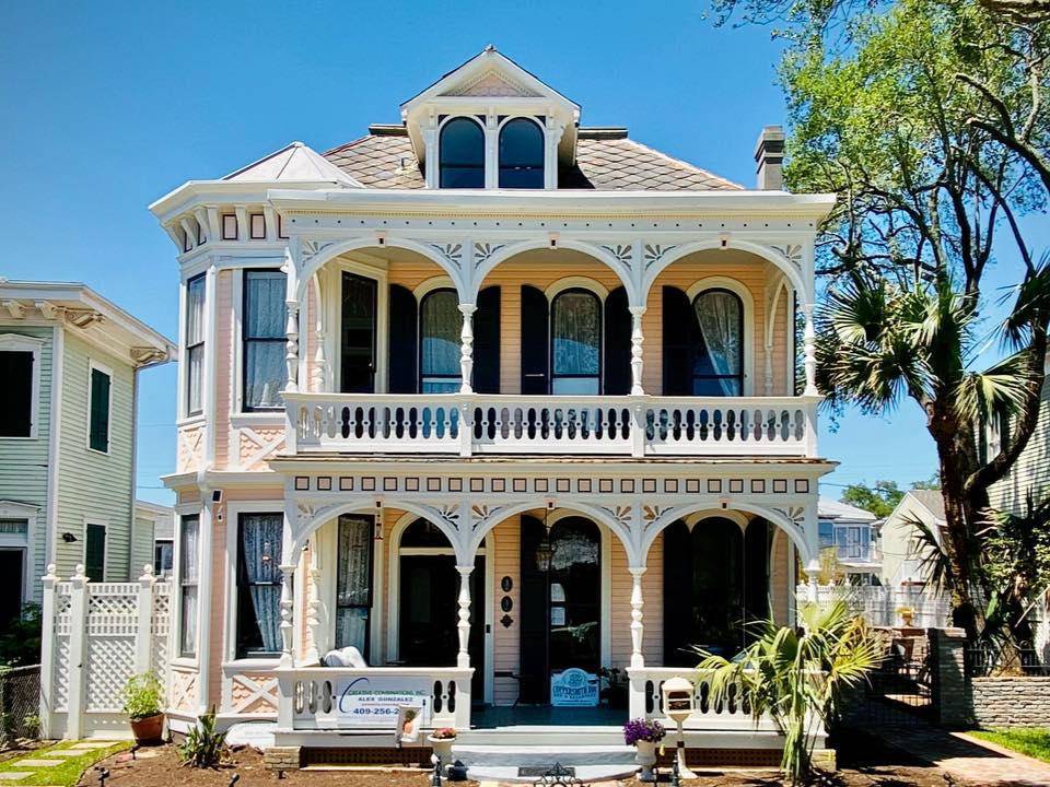 Ornate exterior of a historic building that now serves as a bed and breakfast in Galveston, TX.