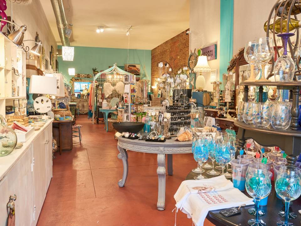 Glasses, mugs, earrings, necklaces and other accessories on display in a shop in Downtown Galveston